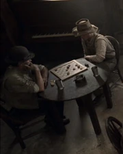Two Humans playing checkers in 