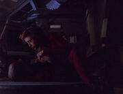 Sisko and Kira in damaged Defiant bridge