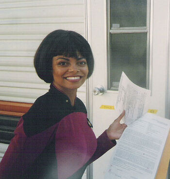 Joyce Robinson in front of her trailer