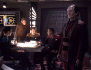 Dax, Odo, O'Brien, Sisko, and Garak in the wardroom