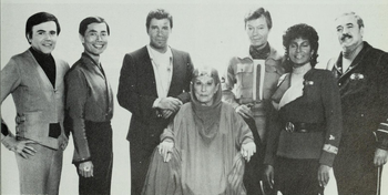 Judith Anderson posing with Star Trek cast