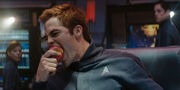 Kirk eating apple