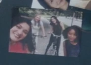 Soji bicycling with her sister and their friends