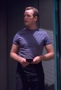 Tom Paris wearing a short-sleeved undershirt