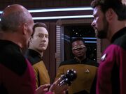 Picard examining Koinonian explosive device