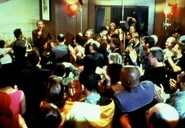 Rene Auberjonois entertains the cast and crew after filming has finished