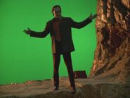 Alaimo in front of a green screen background