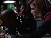 Janeway interrogates Lessing