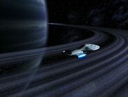 A ringed planet surveyed by Voyager