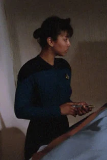 In sickbay Played by an unknown actress (TNG: "The Neutral Zone")
