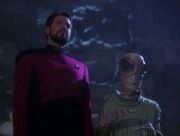 Riker and Barash prepare to beam up