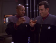 Sisko and Ross share a drink