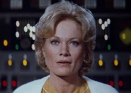 Carol Marcus, 2284.jpg (69 KB) Golden undershirt without coat (under traditional cardigan)