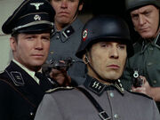 Spock and Kirk are discovered by the Nazis