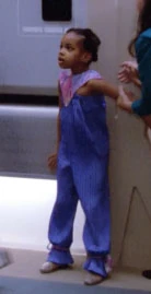 In a corridor Played by an unknown actress (TNG: "Heart of Glory")