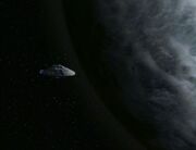 Makull's homeworld devasted with Voyager in orbit