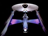 USS Enterprise showing off its pearlescent hull