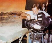 ILM's Robert Hill preparing to film the maquette-matte painting combination of Deneb IV