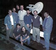 1994: Jein (r), his modified anti-future Enterprise-D model, and the VFX team at Image G TNG: "All Good Things..."