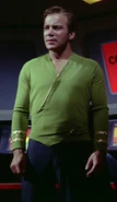 Kirk wearing green wraparound tunic, sleeve rank.jpg (285 KB) Captain Kirk in green tunic variant, edged with golden piping (2267)