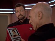 William T. Riker shows Jean-Luc Picard a photo of Jason Vigo