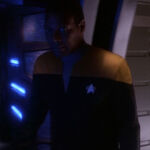 Operations officer in DS9 corridor, 2373