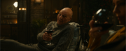 Picard and Laris share a drink