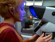 Kes identifies the macrocosm using Sickbay microscopes