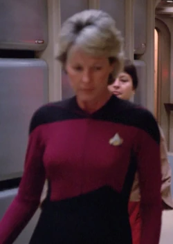In a corridor Played by an unknown actress (TNG: "11001001")