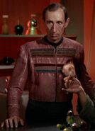 A bartender at Deep Space K-7 TOS: "The Trouble with Tribbles"; DS9: "Trials and Tribble-ations"