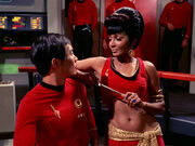 Uhura distracts Hikaru Sulu (mirror)