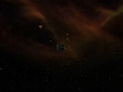 USS Voyager and Borg cube flee exploding planet