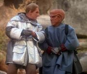 Odo and Quark climbing mountain