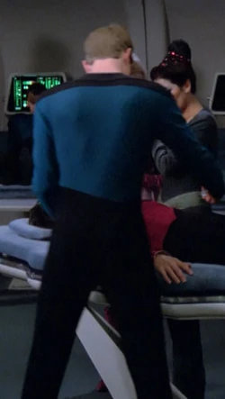 In sickbay Played by an unknown actor (TNG: "Too Short A Season")