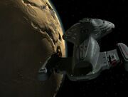 Voyager above an asteroid (Critical Care)