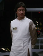 Jedda uniform.jpg (102 KB) White lab vest over gray male long-sleeve, with white Starfleet delta