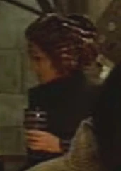 Female alien with jeweled hair Played by Damaris Cordelia