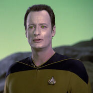 Q takes on Data's look during his game with Riker