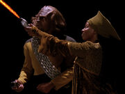 Guinan beats Worf at phaser range