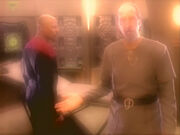 Benjamin Sisko and Akorem Laan confer with Prophets