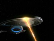 Der Phaserstrahl der USS Voyager wird von der Barriere reflektiert