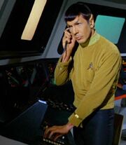 Spock with earpiece and scope