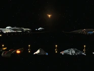 Antarian Trans-stellar Rally ship (right center, farthest out) (VOY: "Drive")