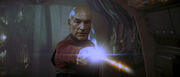 Picard feuert Phaser ab