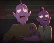 Male and female inhabitants watching