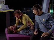 Kirk and Spock try to save McCoy