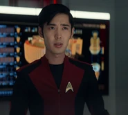 Kyle, 2259.jpg (93 KB) Transporter chief Kyle in a red operations jumpsuit