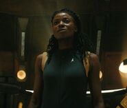 Owosekun sportswear 3190.jpg (57 KB) Lieutenant Commander Joann Owosekun in an operations gold uniform jumpsuit