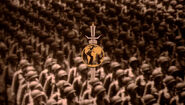 Terran Empire insignia superimposed over footage of marching soldiers