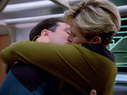 Tasha kisses crewman